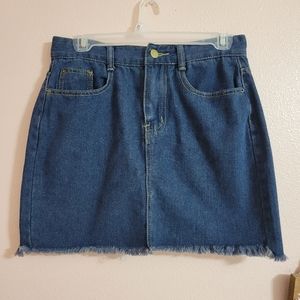 Cute cut off frayed denim jean skirt in size medium